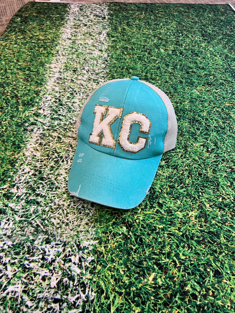 
            
                Load image into Gallery viewer, KC Ivory Chenille Patch Aqua Distressed High Pony Hats
            
        